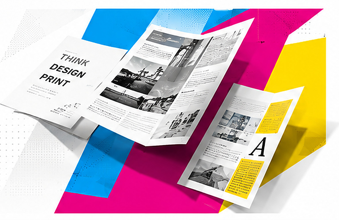 CMYK の版と、刷り上がったパンフレット・冊子が重なるイメージ